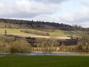 View over flooded fields towards the war memorial above Shoreham, the next small town up the valley from Otford.  Photo by Bill Welch.